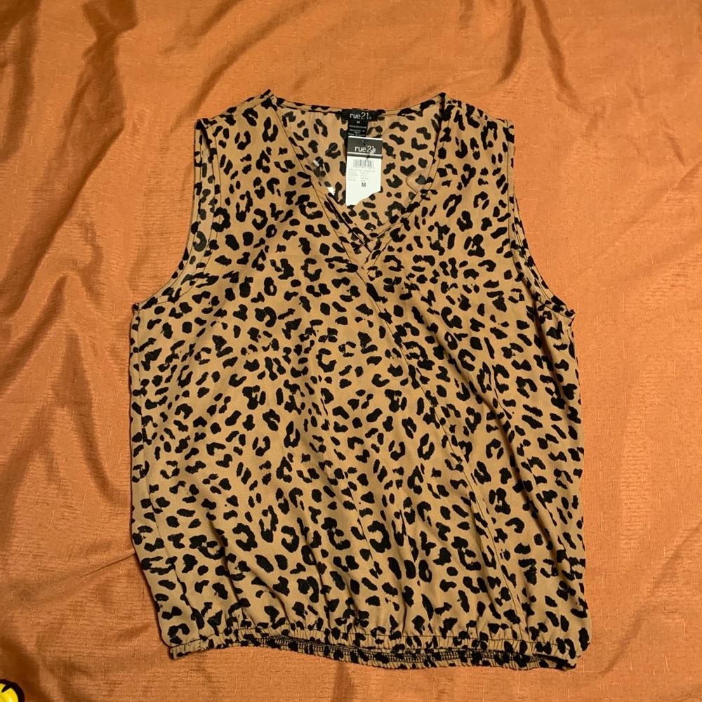 Rue 21 Wrap Blouse Animal Print Size M elastic waist